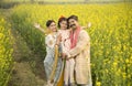 Rural Indian family in agricultural field Royalty Free Stock Photo