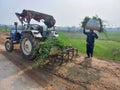 rural Indian landscape with green crops on road side agricultural fields