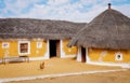 Rural Indian village with mud huts and thatched roof at Jaisalmer, Rajasthan, India Royalty Free Stock Photo