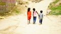 rural kids walking at street