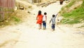 image of rural kids walking at street