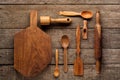 Rural kitchen utensils on vintage planked wood table from above - rustic background Royalty Free Stock Photo