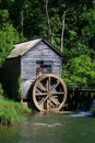 Rural landscape with abandoned watermill in forest Royalty Free Stock Photo