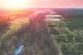 Rural landscape. Aerial view. View of fields, brook, and pine forest in early spring Royalty Free Stock Photo