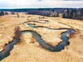 Aerial view of brook bends in spring medow. Belarus Royalty Free Stock Photo