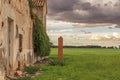 Rural landscape background on a spring afternoon under a cloudy sky that threatens storm.