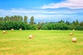 Rural landscape on a beautiful summer day, Tuscany countryside with Alps mountains and blue cloudy sky, Italy Royalty Free Stock Photo