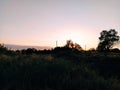 Rural landscape with church at sunset Royalty Free Stock Photo