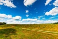 Rural landscape dirt road in the field Royalty Free Stock Photo