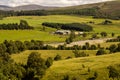 Rural landscape with farms, pastures, cattle, Highlands, Scotland Royalty Free Stock Photo