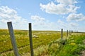 Rural Landscape with Fence Along Farmland Royalty Free Stock Photo