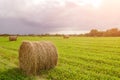 Rural Landscape Field Meadow With Hay Bales After Harvest In Sunny Evening At Sunset Or Sunrise In Late Summer. Blue Sunny Sky And Royalty Free Stock Photo