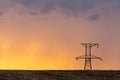 Rural landscape with high-voltage line on sunset Royalty Free Stock Photo