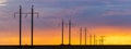 Rural landscape with high-voltage line on sunset Royalty Free Stock Photo