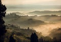 Rural landscape at misty sunrise. Hills of Tuscany with garden trees, villas, green hills, countryside, Italy Royalty Free Stock Photo