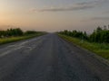 Rural landscape in the morning mist, empty road,