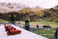 Resting terrace at Trubsee lake station with Mount Graustock and Swiss Alps of Engelberg