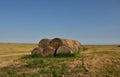 Rural Landscape with Stacked Bails of Hay