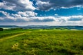 Rural Landscape With Sunlit Clouds In Front Of The Skyline Of Vienna In Austria Royalty Free Stock Photo