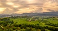 Rural landscape at sunset. Italy mountains, hills and vineyards. panorama. Amazing sky