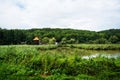 Landscape with traditional windmills at Astra National Museum Complex. Royalty Free Stock Photo