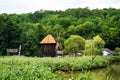 Landscape with traditional windmills at Astra National Museum Complex. Royalty Free Stock Photo