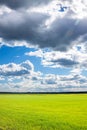 Rural landscape view from field and moody sky Royalty Free Stock Photo