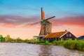 Rural landscape with windmill in Zaanse Schans. Beautiful sunset Netherland landscap Royalty Free Stock Photo