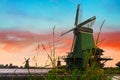 Rural landscape with windmill in Zaanse Schans. Beautiful sunset Netherland landscap Royalty Free Stock Photo