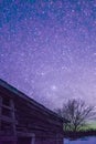 Rural Log Cabin barn at night with stars and milky way Royalty Free Stock Photo