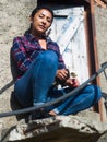 Rural portrait of latino woman at doorway Royalty Free Stock Photo