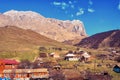 Rural province scene of spring village with mountain Caucasus, R Royalty Free Stock Photo