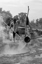 Man working in a factory boiling sugar cane.