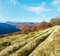 Rural road in autumn mountain Royalty Free Stock Photo