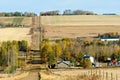 Rural road and farms in fall Royalty Free Stock Photo