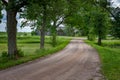 Rural road leading through the fields. Royalty Free Stock Photo