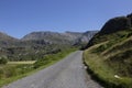 Rural road in the Nant Ffrancon Valley part of the Snowdonia National Park, North Wales. Royalty Free Stock Photo