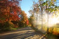 Rural road in Vermont against sun set Royalty Free Stock Photo