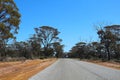 Rural road through the bushland of the Western Australian Wheatbelt Royalty Free Stock Photo