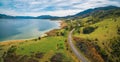 Rural road winding through lake shore. Royalty Free Stock Photo