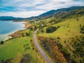 Rural road winding through lake shore. Royalty Free Stock Photo