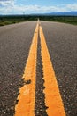 Rural road yellow lines Royalty Free Stock Photo