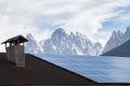 Rural scene of an alpine barn with photovoltaic panels Royalty Free Stock Photo