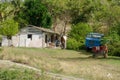 Rural scene in Cuba with shack truck and cart