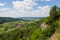 Rural scene with hill panorama, meadows, forest, houses of village Unterzaunsbach in Franconian Switzerland, Germany