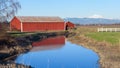 Rural scene with red barn and Mount Baker in the Skagit Valley