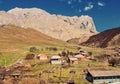 Rural scene of spring village with mountain Caucasus, Russia, Re Royalty Free Stock Photo