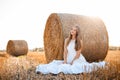 Beautiful smiling girl in agricultural field Royalty Free Stock Photo