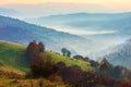 Rural scenery on a foggy sunrise in mountain