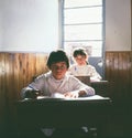 rural school, in the province of buenos aires argentina, boys of 9 years old, seated.